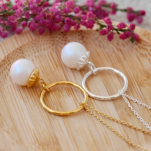 Naszyjnik srebrny i pozłacany z zawieszką z okrągłą perłą swarovskiego